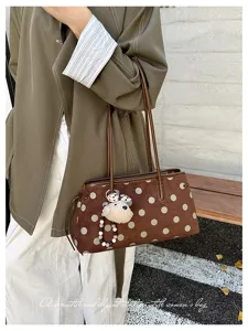 Stylish brown polka dot shoulder bag for women, elegant vintage underarm tote handbag.