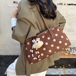 Stylish brown polka dot tote bag with cute bear pendant, large capacity casual shoulder bag.