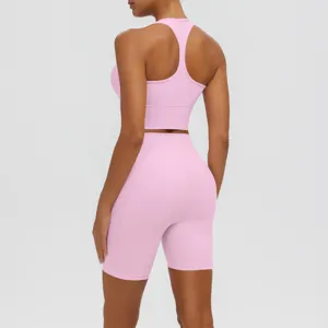 Ensemble de yoga rose pour femme, soutien-gorge de sport et short de cycliste pour fitness.