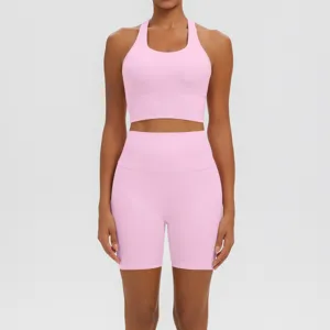 Ensemble de yoga fitness rose pour femmes, short de course taille haute respirant et soutien-gorge.