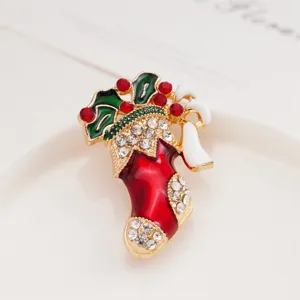 Exquisite Christmas stocking brooch with sparkling rhinestones and colorful enamel, ideal holiday accessory.