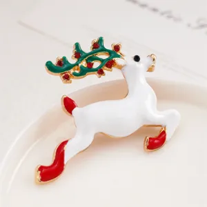 Christmas reindeer brooch with enamel white body green antlers and red rhinestones for women.