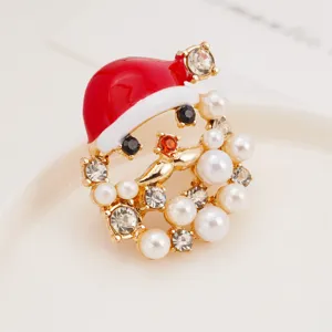 Exquisite Christmas Santa Claus brooch with pearls and rhinestones, elegant holiday jewelry.