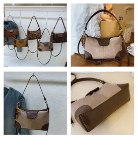 Vintage suede patchwork shoulder bag for women, chic retro underarm tote bag with charm.