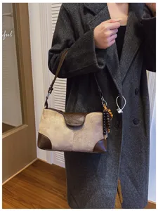 Vintage contrast color shoulder underarm bag for women, stylish commuter tote daily use.