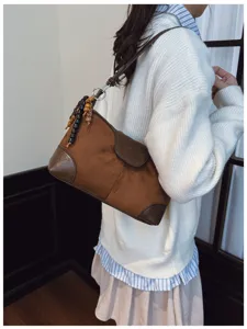 Vintage brown suede patchwork underarm shoulder bag for women stylish daily commuting tote.