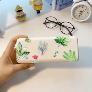 Detailed close-up view of aesthetic botanical watercolor fern leaf stickers for DIY crafts.