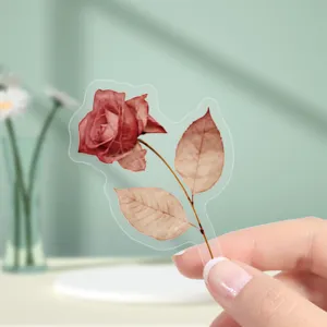 Detailed close-up shot of transparent vintage rose flower PET sticker for journal decor