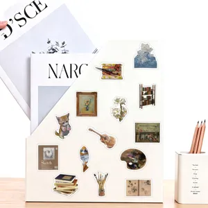 Detail view of retro artistic painting stickers displayed on a white magazine holder for diy decor.
