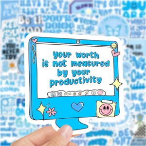 Detail shot of blue computer quote sticker, waterproof DIY journal scrapbooking decoration.