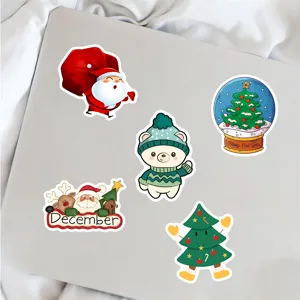 Adesivi decorativi impermeabili natalizi per laptop, smartphone, valigia e skateboard.