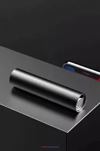 Details of the mini portable strong light metal LED flashlight, compact design with USB charging.