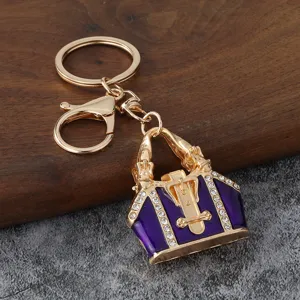 Porte-clés mini sac à main en émail avec strass, pendentif anneau de clé élégant pour femmes.