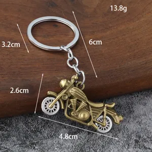 Vintage metal motorcycle keychain, alloy retro bike pendant keyring, stylish fashion accessory.