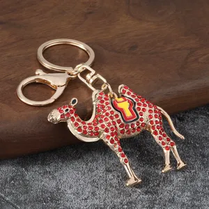 Creative rhinestone camel car keychain cute metal animal key ring pendant bag accessory.