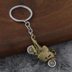 Vintage metal motorcycle keychain, retro bronze bike model pendant for men car keys.