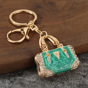 Luxury rhinestone handbag keychain, gold metal drop oil key ring backpack pendant charm.