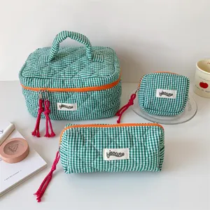 Green plaid cosmetic bag set with zipper and tassel, cute travel makeup pouch for women.