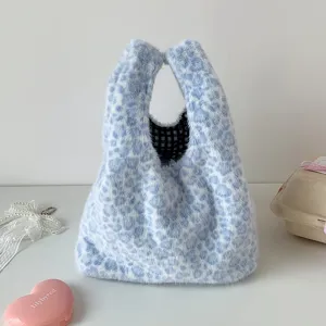 Blue leopard print plush handbag, soft textured tote bag for daily commuting and casual look.