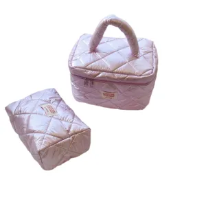 Pink quilted cosmetic bag set, stylish puffer makeup storage organizer for daily travel.