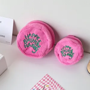 Pink plush round coin purse mini headphone pouch cute furry zip wallet for women and girls.