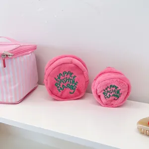 Cute pink plush round coin purse and mini earphone pouch set with nice green embroidery.