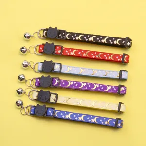 Cute moon print cat collar with bell and breakaway cat face buckle pet neck strap detail