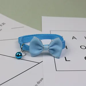 Blue pet collar detail, features a cute bowknot and a ringing bell for cats and puppies.