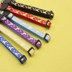 Colorful cat collar set with moon star print, nylon webbing and safety buckle for small pets.