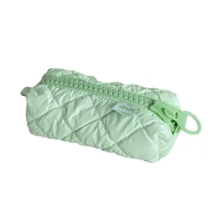 Light green quilted cosmetic bag with large zipper design for daily travel storage.