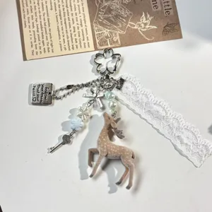 Cute flocked deer keychain with lace ribbon and pearl beads, perfect bag charm accessory.