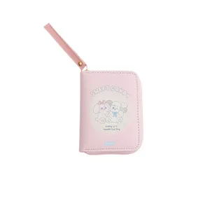 Cute pink PU leather card holder wallet for women girls with wrist strap and zipper design.