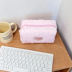 Pink plush cosmetic bag, soft furry makeup pouch, large capacity travel wash storage bag.