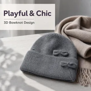 Grey knitted winter beanie hat for women featuring cute 3D bowknot design, warm and cozy.