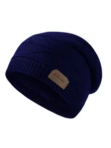 Close-up detail of the cozy fleece-lined dark blue knit beanie with a stylish leather patch.