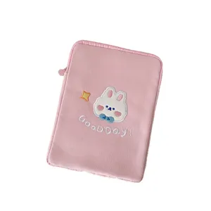 Pink corduroy tablet sleeve with cute rabbit embroidery and zipper closure for daily use.