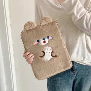Plush tablet sleeve detail shot, soft furry texture with cute bear design, cozy protective case.