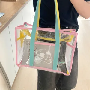 Clear PVC tote bag with colorful straps, waterproof beach bag for summer outdoor use.