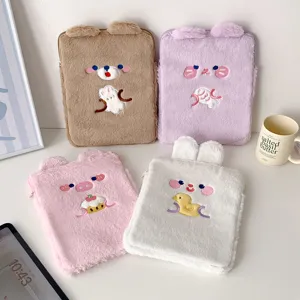 Cute plush tablet sleeve for 11 inch iPad, soft furry inner bag with cartoon embroidery.