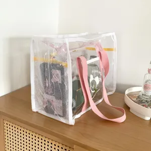 Transparent PVC mesh tote bag with pink handles, large capacity beach storage bag for summer.
