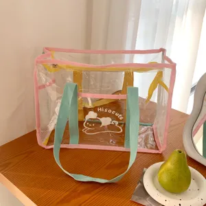 Transparent PVC tote bag for summer beach and waterproof swimming storage bag detail.