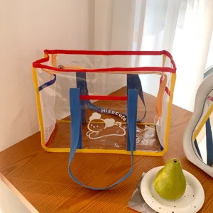 Transparent PVC beach tote bag with colorful trim, waterproof outdoor swimming storage bag for women.