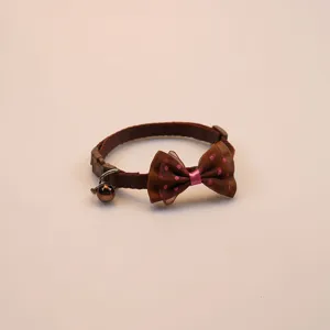 Brown pet bow collar with polka dot design and cute bell, ideal for small cats and dogs.