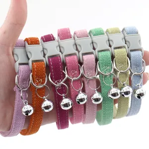 Colorful fabric pet cat dog collars with safety buckle and bell, adjustable soft strap.