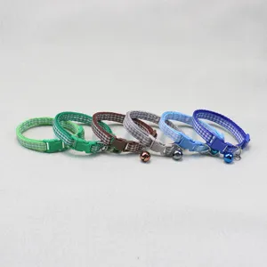 Colorful pet plaid collar set with bell and durable plastic buckle for cats and dogs.