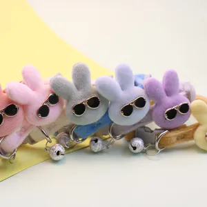 Plush rabbit pet collar with cute sunglasses and bell, perfect detail for small cats and dogs.