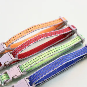 Close-up of colorful adjustable reflective pet collars with safe buckles, for dogs and cats.