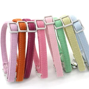 Colorful fabric pet collars with adjustable buckles and bells for cats and dogs, multi-color.