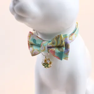 Floral pet collar detail, colorful bowknot and cute hanging bell, soft neck strap.