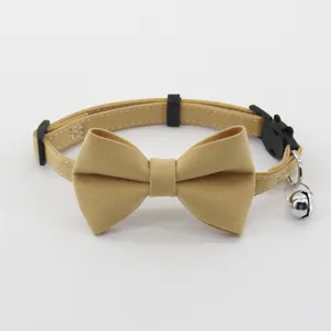 Retro solid color bowknot pet collar with bell for cute cats and small dogs daily wear.